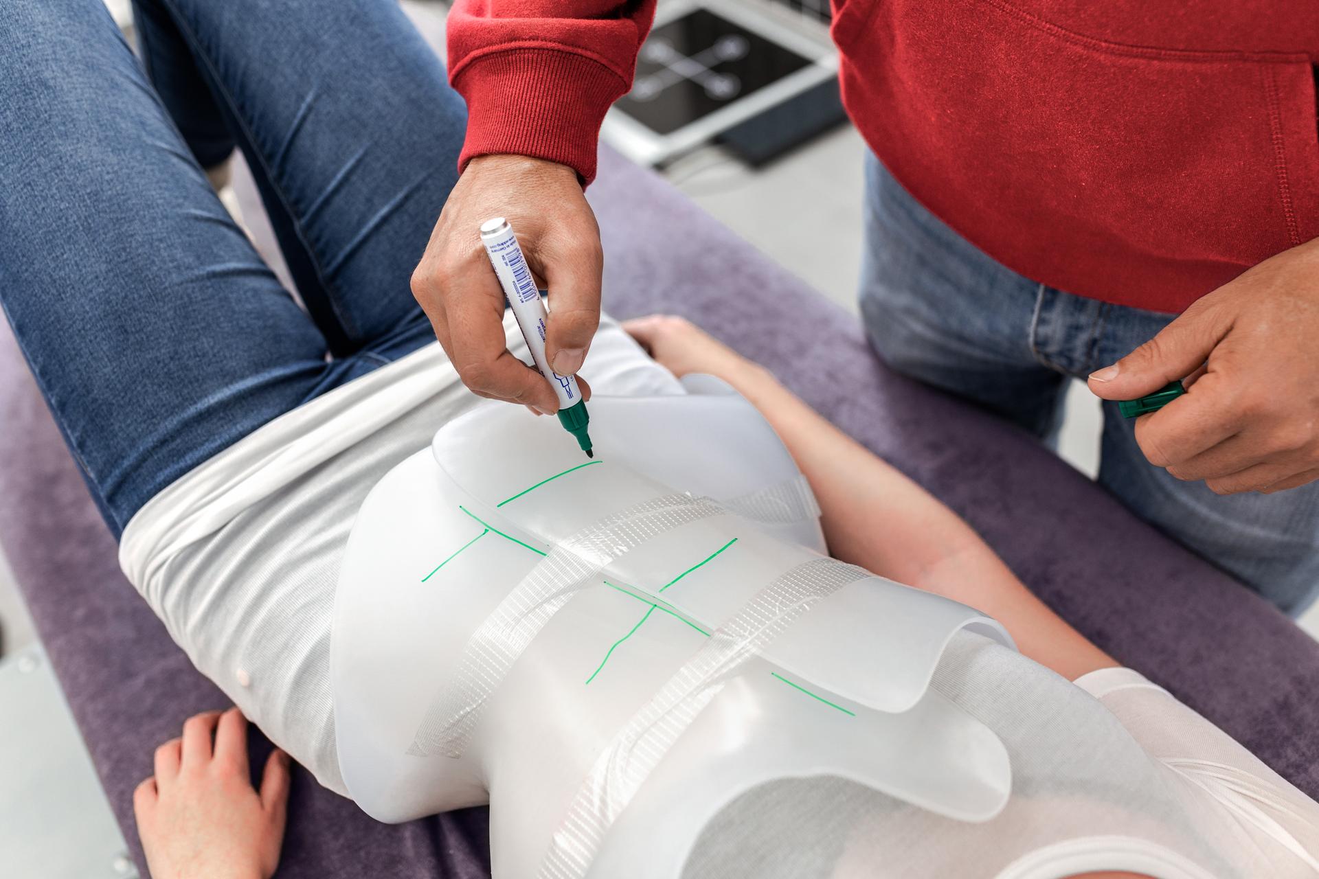 Patient during brace fitting consultation